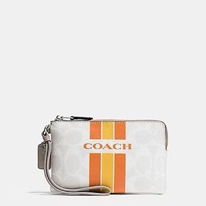 NWT COACH Varsity Wristlet zip corner around